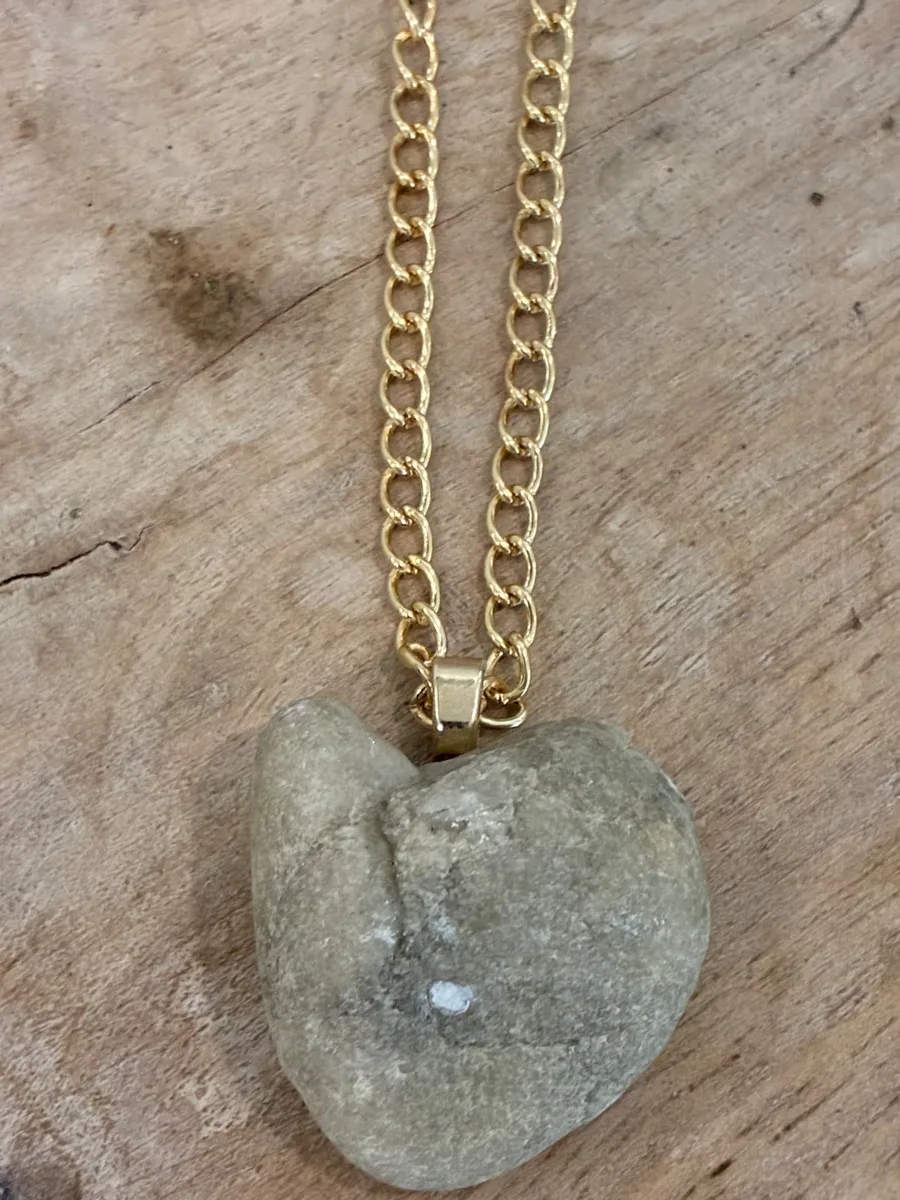 Grey Shore Heart — naturally heart-shaped grey beach stone on a gold-tone chain