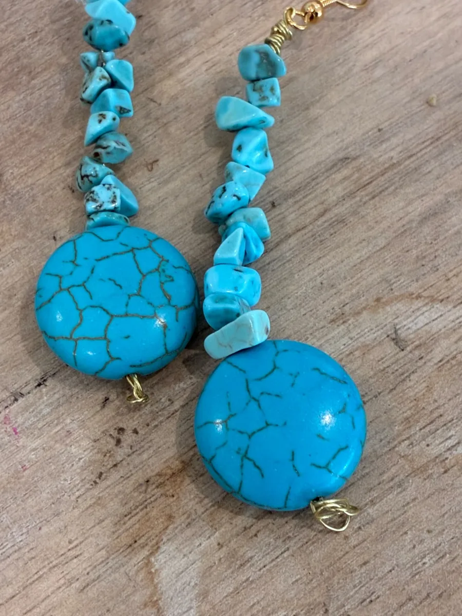 Turquoise Tide Earrings — long turquoise beaded drops with round stone discs